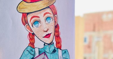 "دينا" تبدع فى التصوير والرسم بلقطات مختلفة