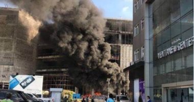 المئات عالقون على سطح المبنى.. حريق فى مركز التجارة الدولى بهونج كونج... صور وفيديو