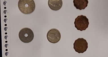 جمارك مطار القاهرة تضبط راكبا بحوزته عملات معدنية أثرية 