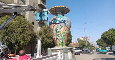 تنظيف تماثيل وجداريات مدخل مدينة قنا الغربى