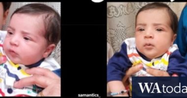 عودة طفل أفغانى سلمه والده للجيش الأمريكى خلال الإجلاء لذويه.. صورة