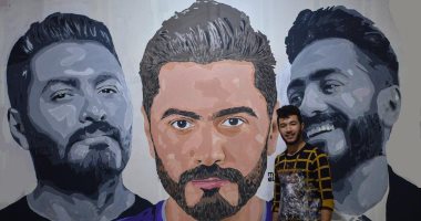 "الجسمي" يرسم جرافيتى وبداية نجاحه صورة لمحمد صلاح