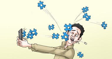 حرب هاشتاجات على مواقع التواصل الاجتماعى.. كاريكاتير "اليوم السابع"