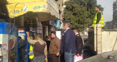 حى الدقى يغلق عددا من المحلات المخالفة ويزيل 8 أكشاك