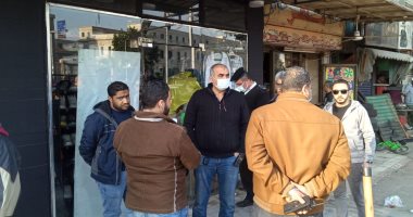 حى الدقى يشن حملات لمراجعة الرخص ويشمع كافيه ومحل ملابس شهيرا