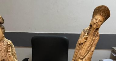 جمارك مطار القاهرة الدولى تضبط محاولة تهريب تماثيل مصنوعة من العاج.. صور