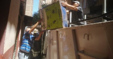تحرير مخالفات تعد وإشغال طريق لمحلات ومقاهٍ بدون تراخيص في الجيزة 