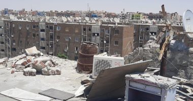 إزالة سور آيل للسقوط أعلى إحدى العمارات بحى ثالث الإسماعيلية