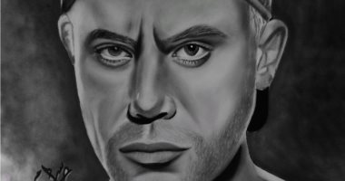 "حسام" يشارك برسومات فنية وبورتريه تبرز موهبته فى الرسم