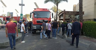 النيابة العامة تعاين موقع حريق كارفور في الإسكندرية