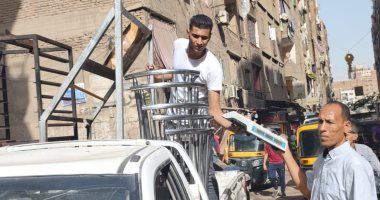 رفع 400 حالة إشغال للمحال والمنشآت التجارية بأحياء الجيزة