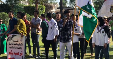 جامعة أسيوط تستقبل الطلاب فى أول أيام الدراسة بالنشيد الوطنى وتحية العلم