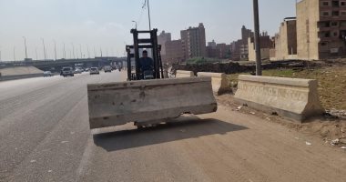 محافظة الجيزة: تركيب حواجز خرسانية بعدد من قطاعات الطريق الدائرى.. صور
