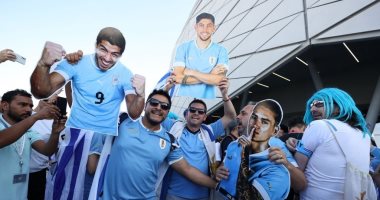 كأس العالم 2022.. جماهير أوروجوي تظهر مع مشجعى كوريا بالزي العربى " صور "