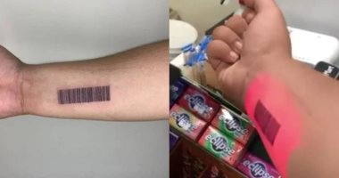 تايوانى يدفع النقود باستخدام ساعده بفضل تطبيق "باركود تاتو".. صور