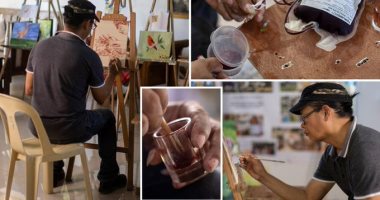 فن غير تقليدى.. فلبينى يرسم لوحات بقطرات دمه ويسعى لتسجيل رقم عالمي "صور"