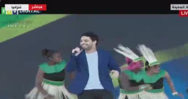 المطرب أحمد جمال يقدم فقرة فنية فى احتفالية ملء سد جوليوس نيريرى بتنزانيا