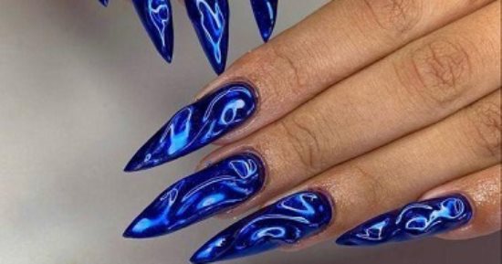 استوحي طلاء أظافرك من تقلبات شهر أمشير.. تصميمات تشبه الزعابيب