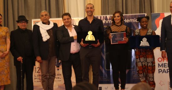 مهرجان الأقصر للسينما الأفريقية يعلن جوائز دورته الـ 12.. فيلم "شيموني" الكيني يحصل على جائزة النيل الكبرى لأحسن فيلم روائي طويل.. وجائزة لجنة التحكيم الخاصة تذهب للفيلم المصرى "بعيدا عن النيل"