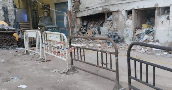 انهيار أجزاء من مبنى خالٍ وبناء قديم بالجمرك في الإسكندرية.. صور