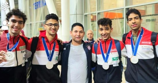 وصول بعثة سلاح السيف بعد التتويج بفضية بطولة العالم 