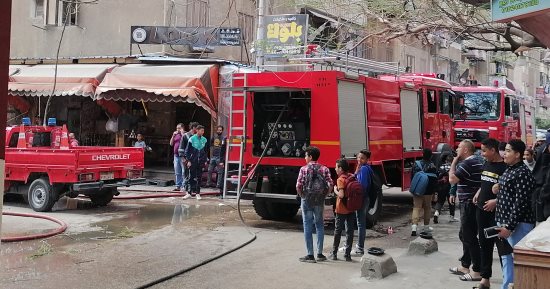 الحماية المدنية فى بورسعيد تسيطر على حريق برج حمام.. صور