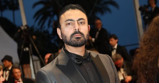 محمد كريم على السجادة الحمراء لمهرجان كان لحضور عرض il sole dell'avvenire