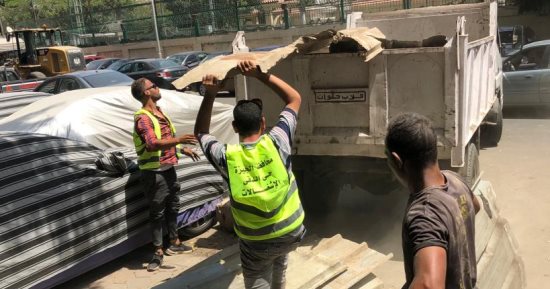 إزالة تعديات على جراج بالدقى وإعادة فتحه لانتظار السيارات