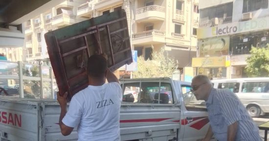 رفع الإشغالات المخالفة الواقعة أسفل كوبرى عبد الرازق السنهورى بمدينة نصر