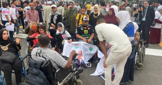 ذوو الهمم يشاركون بمسيرة ميدان الجلاء ويطالبون الرئيس السيسى بالترشح