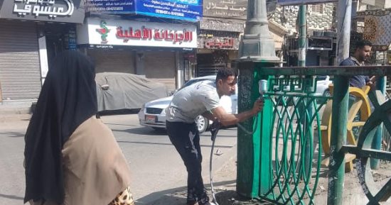 حملة مكبرة لطلاء الأعمدة والأسوار بحى الجون فى الفيوم.. صور