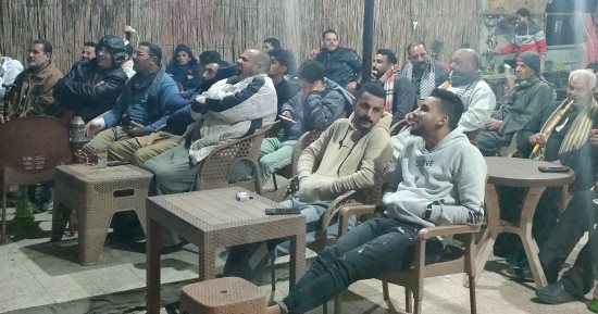 أهالى قرية محمد صلاح فى الغربية يتوافدون لمتابعة لقاء مصر وغانا.. فيديو