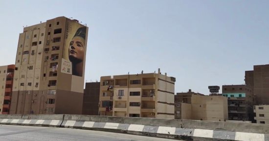 تقدم نسب تنفيذ أعمال طلاء وتجميل العقارات المطلة على الدائرى بالجيزة.. صور