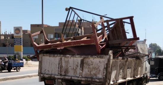 إزالة الإشغالات والتعديات على حرم الطريق السريع بمدينة أبوتيج فى أسيوط