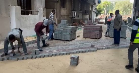 بدء تطوير ورصف عدد من شوارع حى الدقى بالإنترلوك.. فيديو