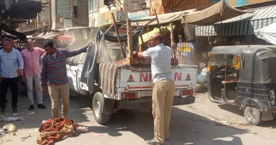 حملة لرفع الإشغالات والمخالفات بشوارع مدينة طهطا فى سوهاج