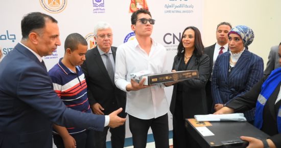 وزيرة التضامن تسلم جامعة الأقصر الأهلية طابعة برايل ولاب توب لذوى الإعاقة البصرية