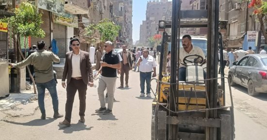 حملة مكبرة بالطالبية لرفع الإشغالات وإزالة التندات والبروزات المخالفة.. صور