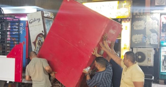 إزالة إشغالات وحواجز مخالفة فى حملة ليلية موسعة بشوارع العجوزة.. صور