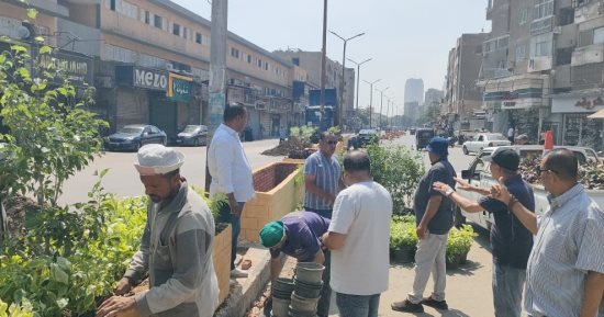 رفع كفاءة شارع العامل الأول بإمبابة بعد إخلائه من الإشغالات والتعديات