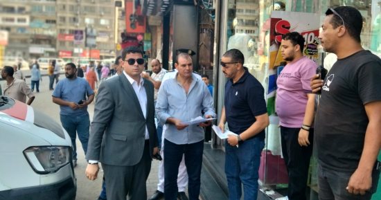 حملات طرق أبواب لتقنين أوضاع المحال والإشغالات بشوارع بولاق الدكرور