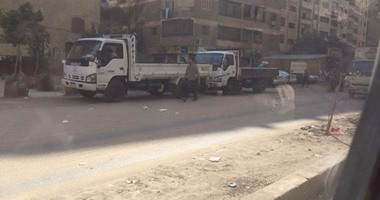 "صحافة المواطن"..جراج لسيارات النقل وسط شارع بالهرم يعيق حركة المرور