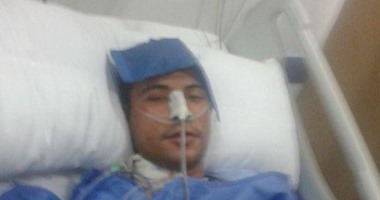 بالصور.. مأساة شاب أصيب بطلق نارى فى حادث اغتيال أمين شرطة منذ 8 أشهر ببنى سويف.. "أحمد" أصيب بثقب بالمعدة واستئصال الطحال وتهتك بالكبد.. ويطالب بتوفير فرصة عمل.. يؤكد: الإرهاب لا يفرق بين شرطى ومدنى