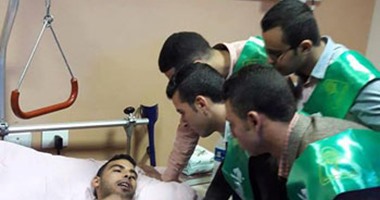 وفد من جامعة المنوفية يزور مصابى القوات المسلحة بمستشفى حلمية الزيتون