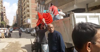 حى غرب القاهرة يغلق مقهيين مخالفين ويصادر أغراضهما