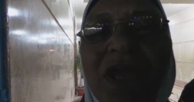 السيدة التى صفعها إخوانى: "إحنا وراك يا سيسى وأنت رئيسى"