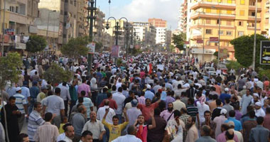عدد من مؤيدى مرسى يتجمعون بميدان الألف مسكن 