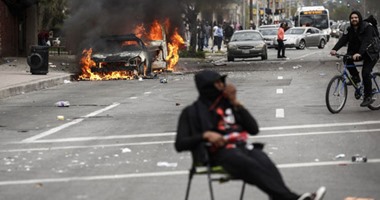 "المصرى لدراسات الديمقراطية": أحداث "بالتيمور" تنذر بثورة  فى أمريكا