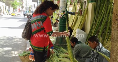 بالصور.. الأقباط يحتفلون بعيد السعف بأسيوط وقنا