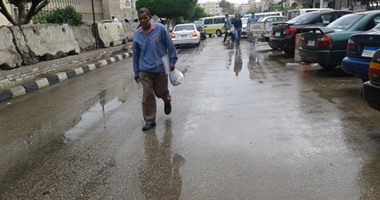 أمطار غزيرة مصحوبة بغيوم فى دمياط.. والمياه تغمر الشوارع والطرق الرئيسية